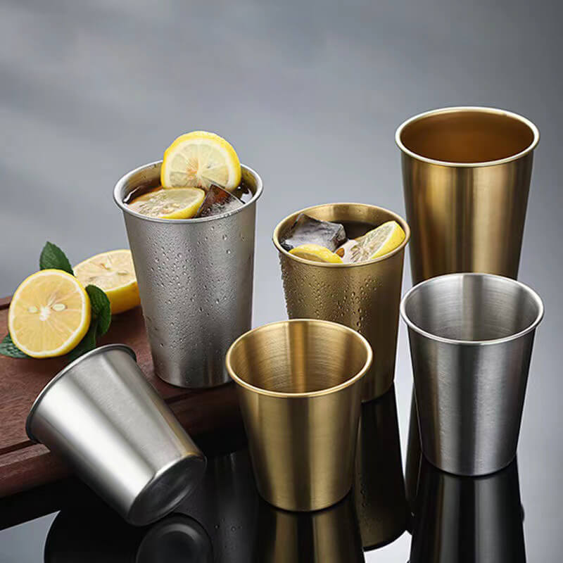 stainless steel beer tumbler with some drinks.jpg